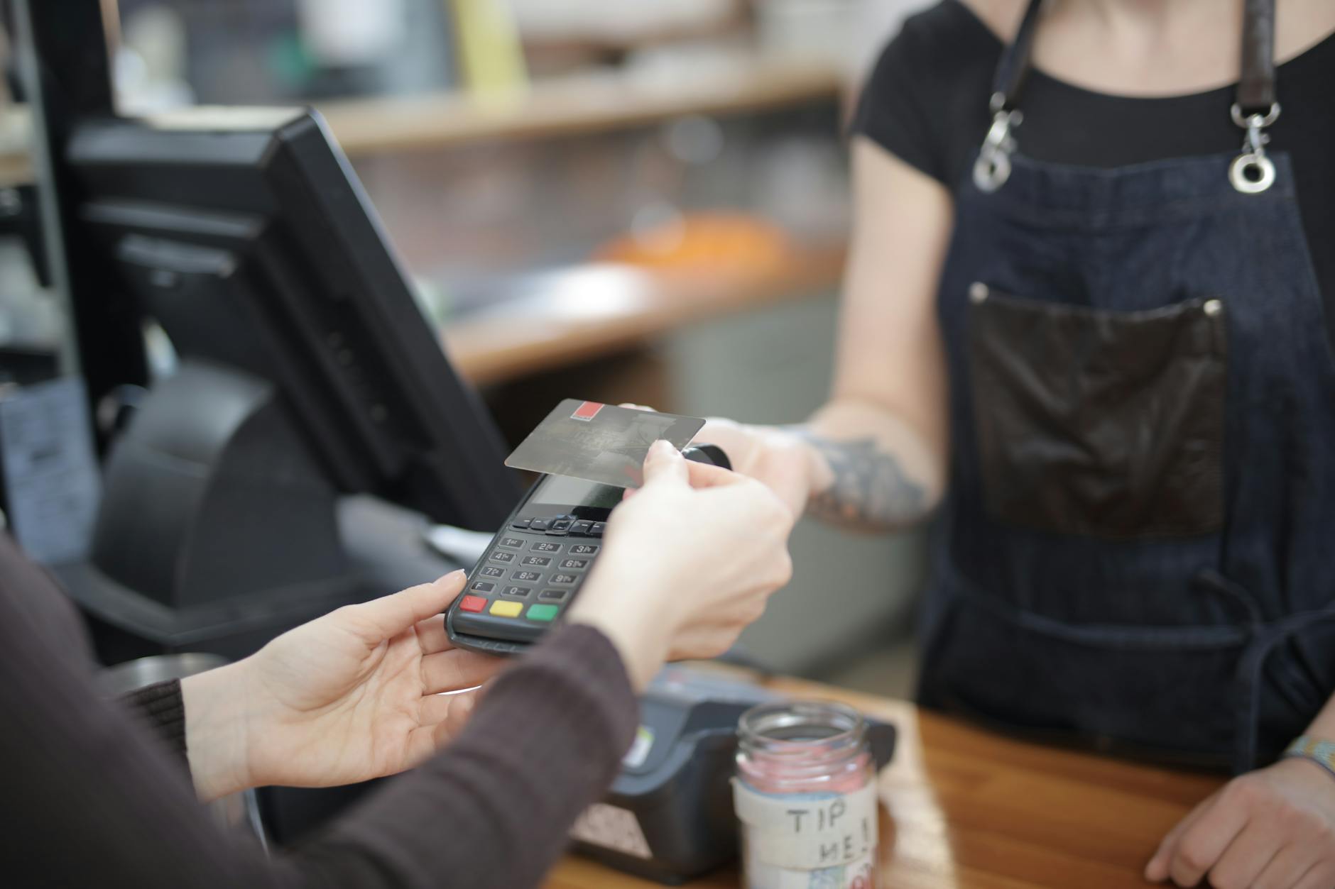 Person paying off their credit card balance online