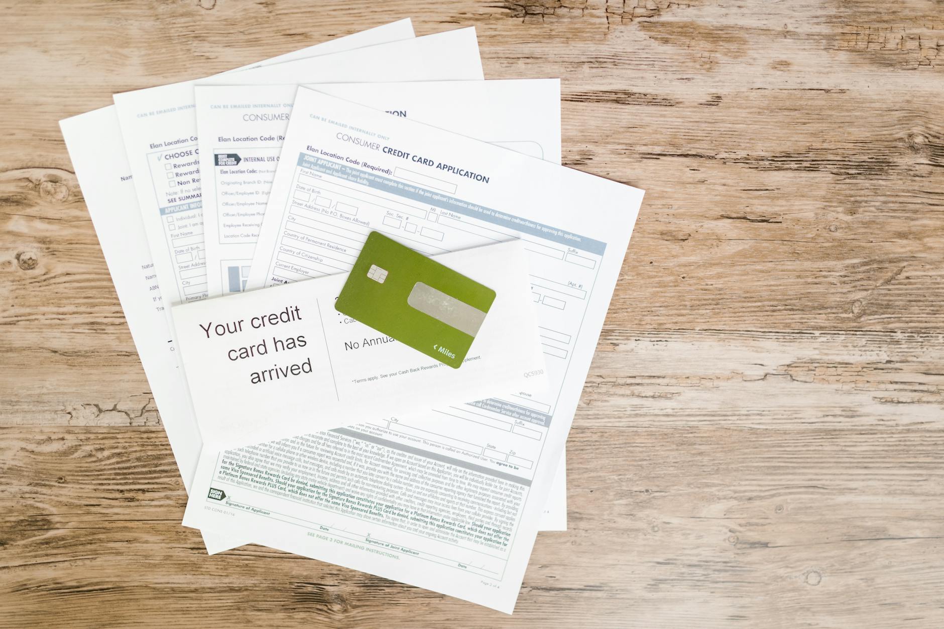 Person holding a credit card for the first time