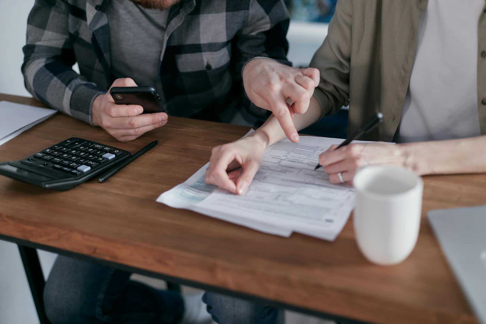 Couple saving money together toward a shared financial goal