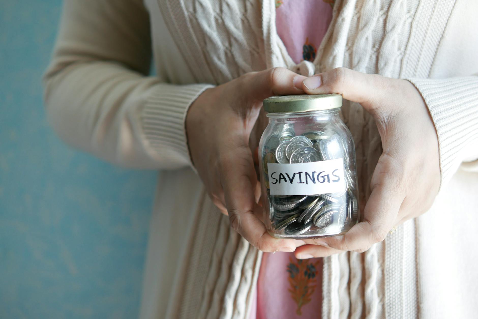 Person setting up savings and budget