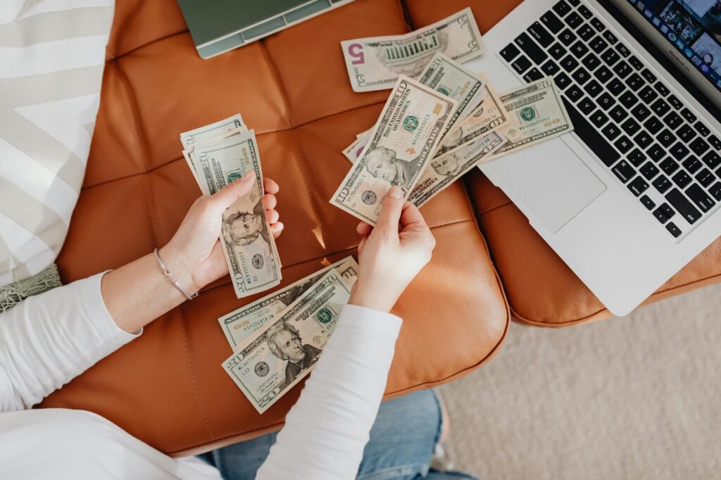 Coins growing like plants representing passive income and investment growth