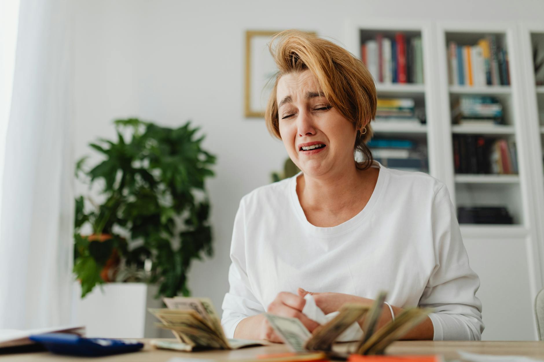 Person looking stressed about financial mistakes related to student loans